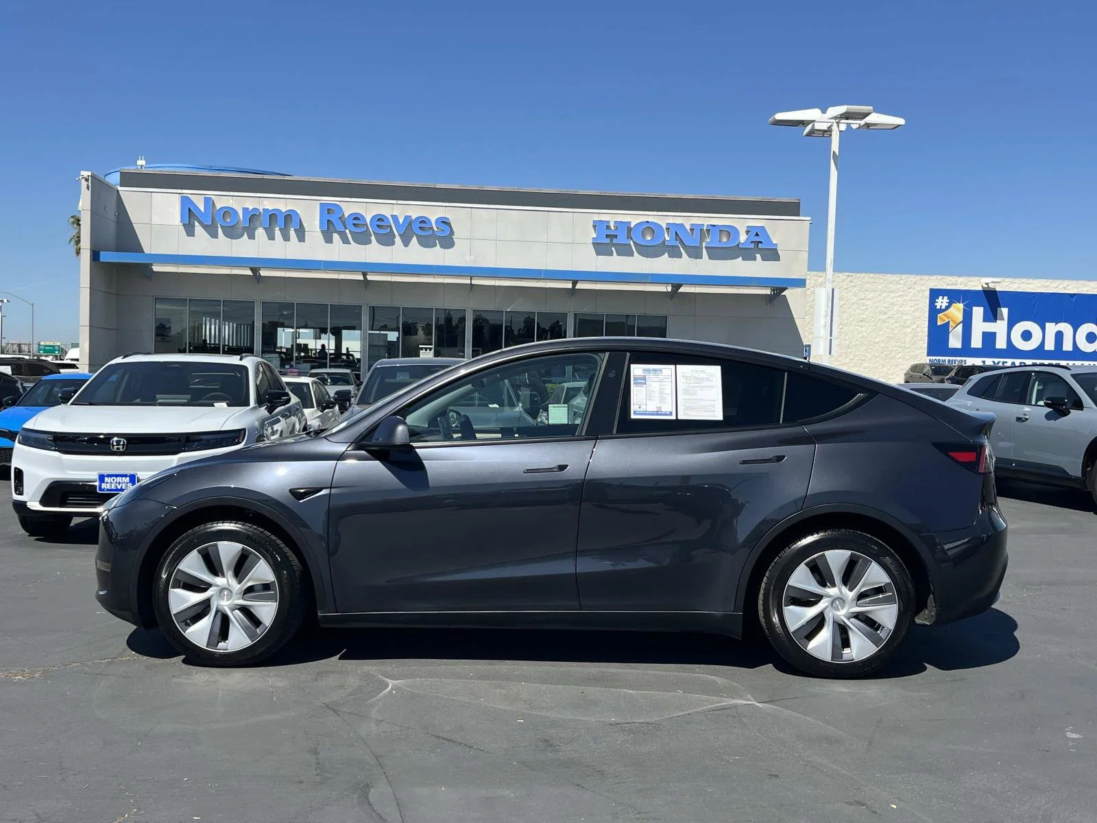Used 2024 Tesla Model Y Long Range with VIN 7SAYGDEE4RA249796 for sale in Irvine, CA