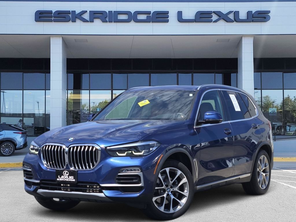 Used 2021 Blue BMW xDrive40i image 1