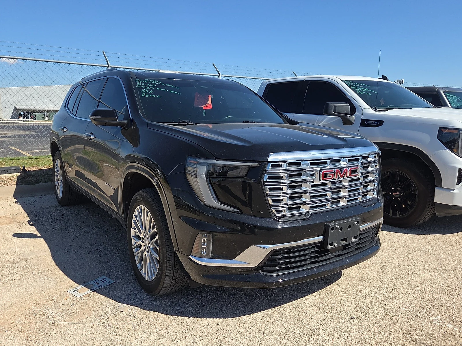 Used 2024 Ebony Twilight Metallic GMC Denali image 2