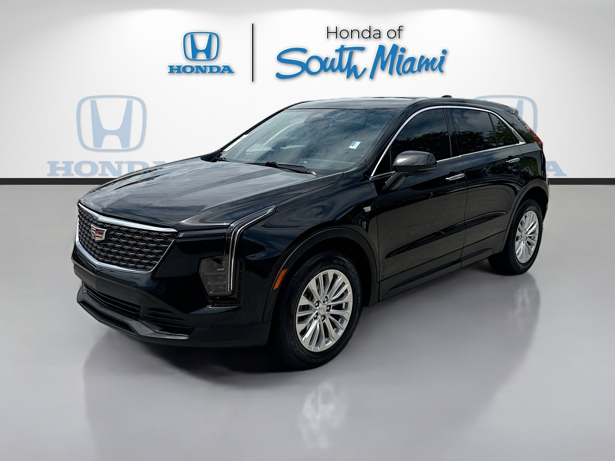 Used 2024 Stellar Black Metallic Cadillac FWD Luxury image 3