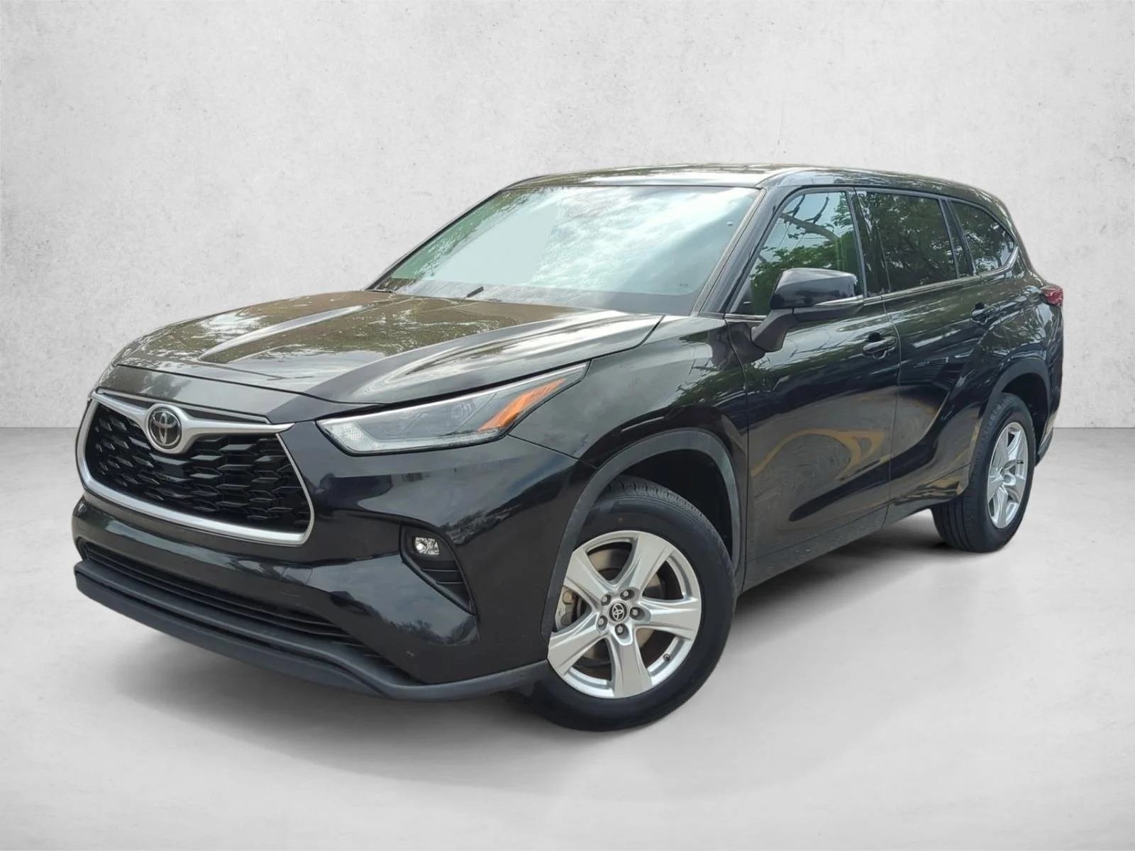 Used 2021 Midnight Black Metallic Toyota LE image 1