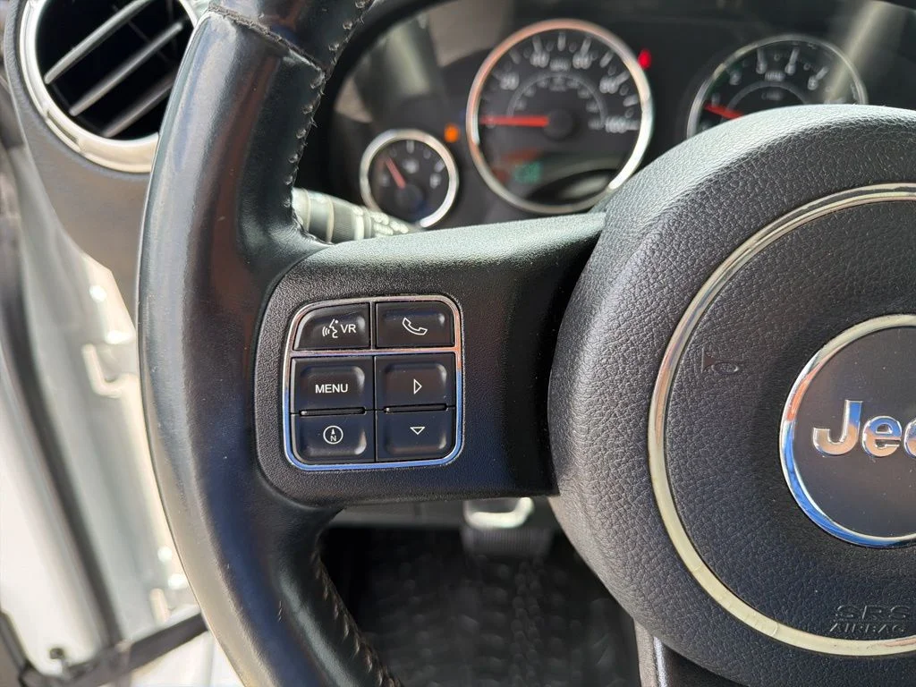 Used 2015 White Jeep Unlimited Sahara image 39