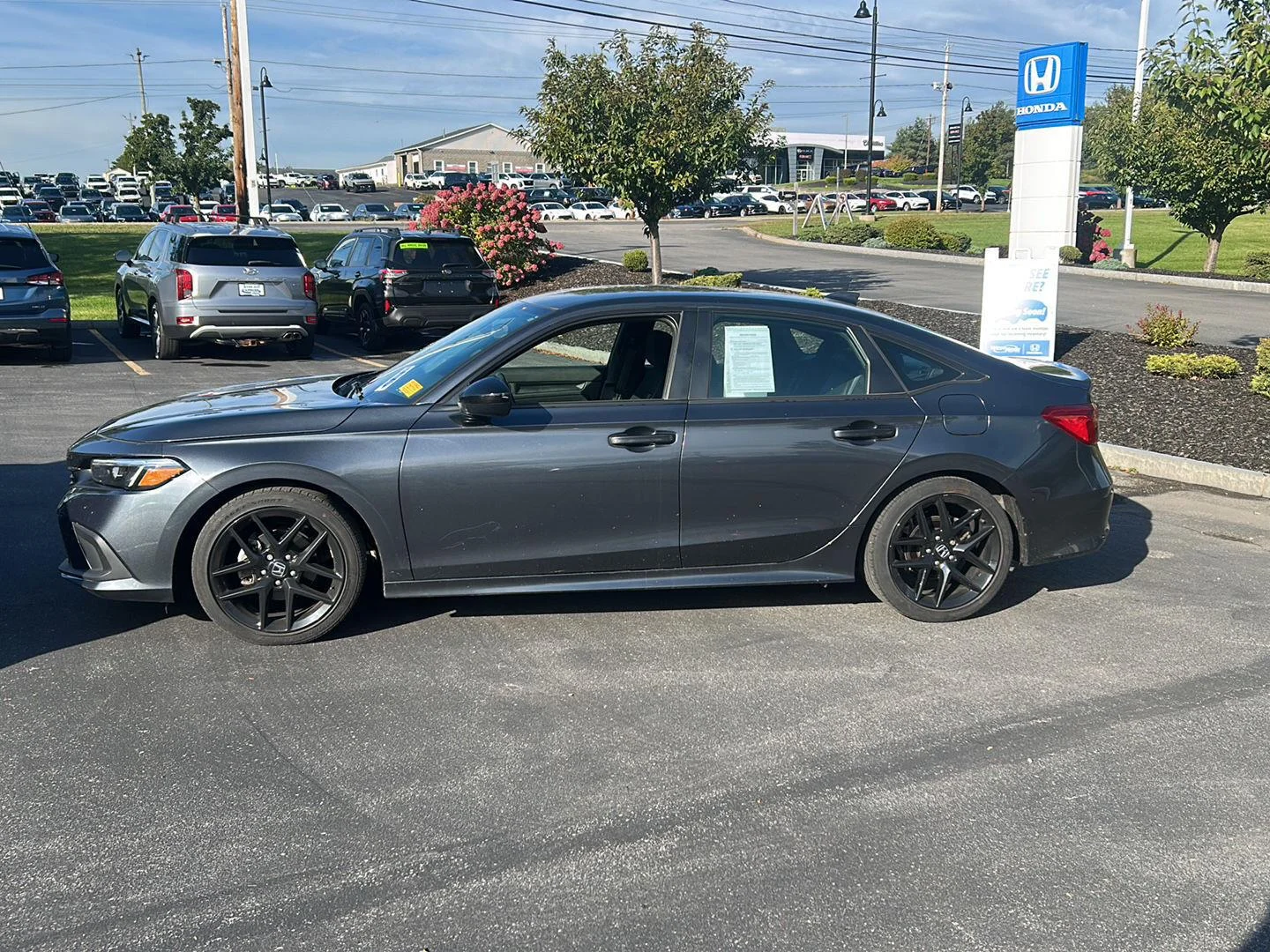 Used 2024 Meteorite Gray Metallic Honda Sport image 3