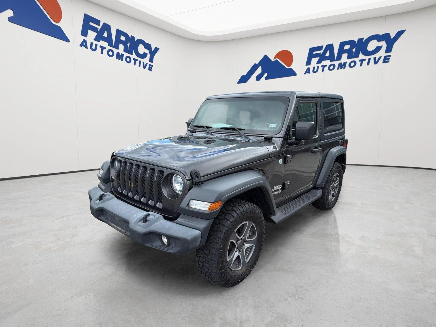 Used 2019 Granite Crystal Metallic Clearcoat Jeep Sport S image 1