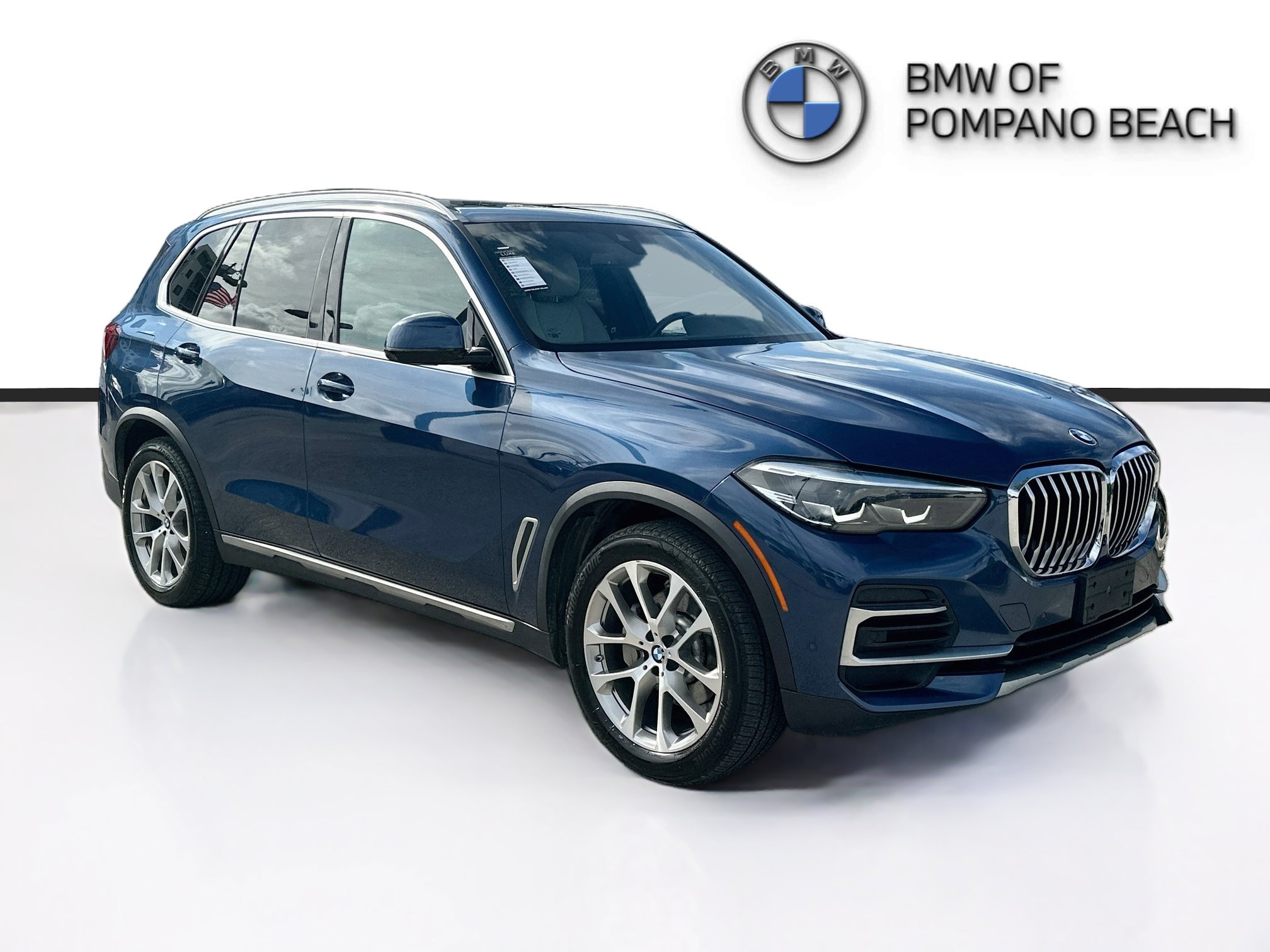 Used 2023 Phytonic Blue Metallic BMW xDrive40i image 1