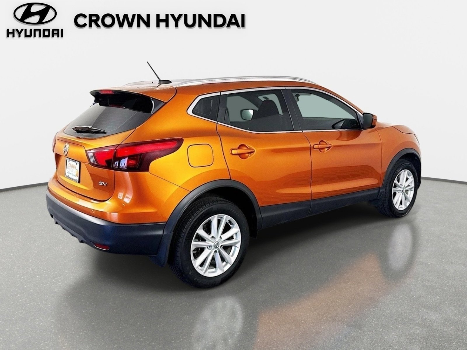 Used 2017 Monarch Orange Nissan SV image 5
