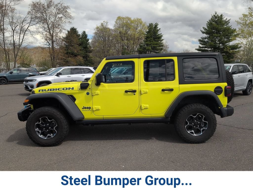 Certified Used 2023 Yellow Jeep Rubicon 4xe image 8
