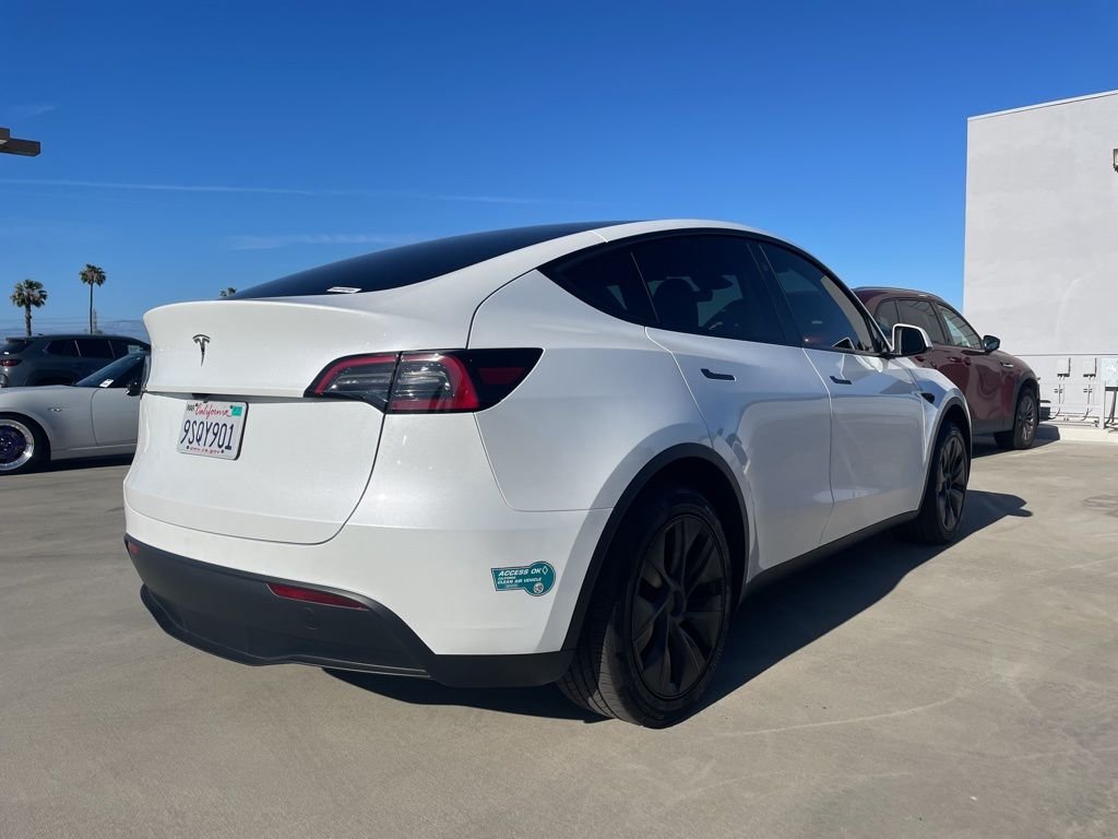 Used 2025 Tesla Model Y Long Range with VIN 7SAYGDED1SF321070 for sale in Orange, CA