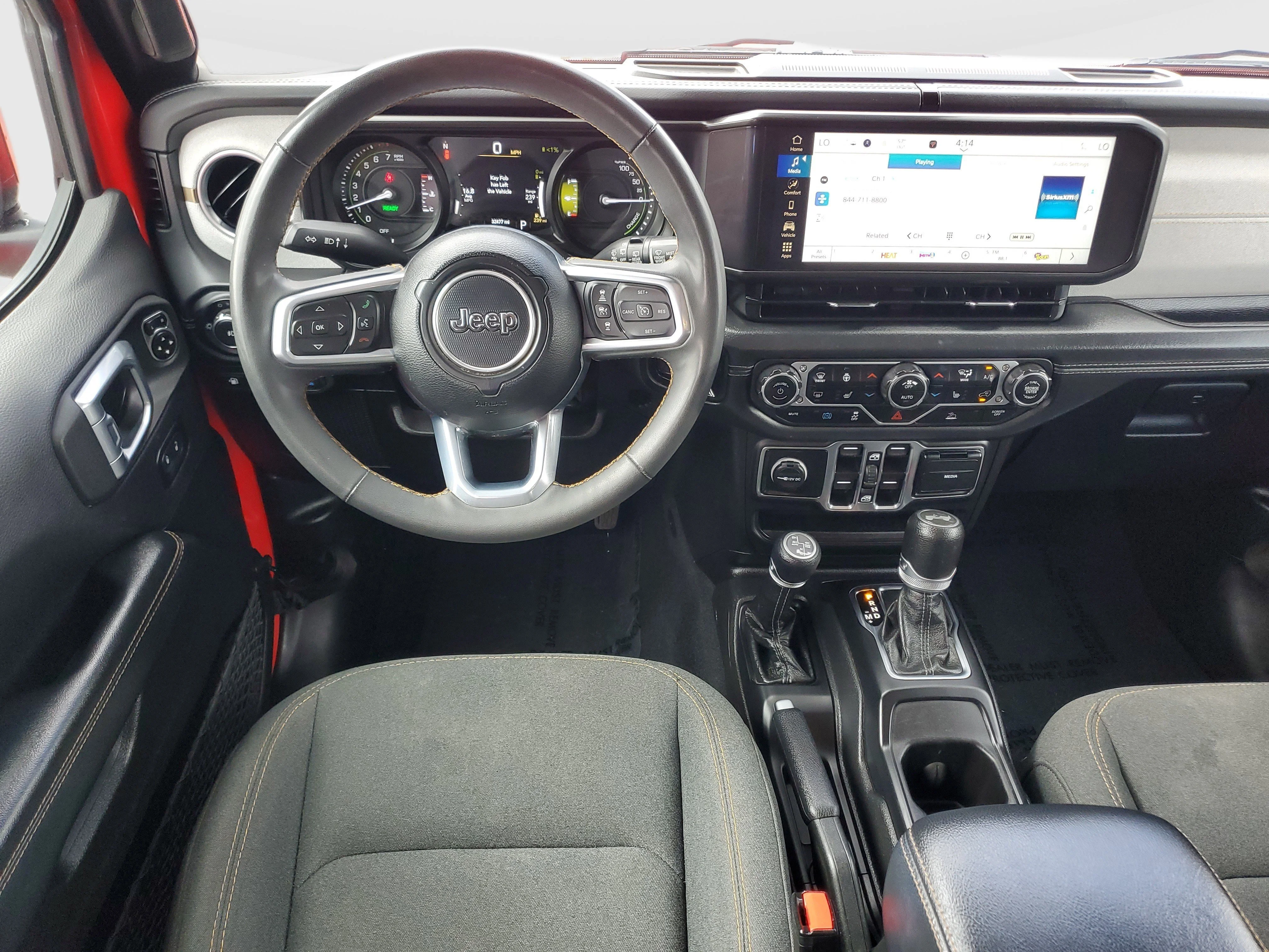 Used 2024 Red Jeep Sahara 4xe image 16