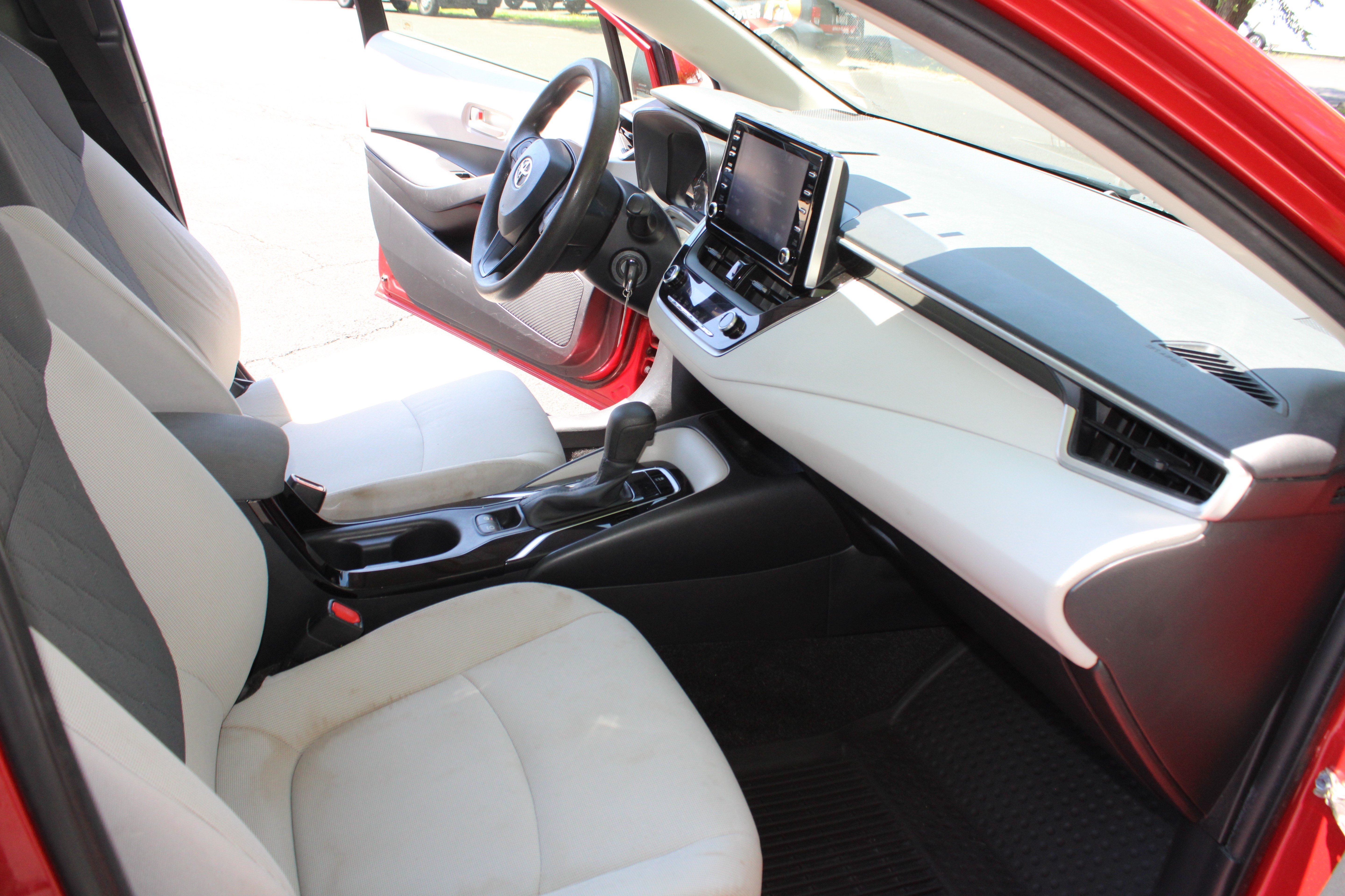 Used 2020 Barcelona Red Metallic Toyota LE image 19