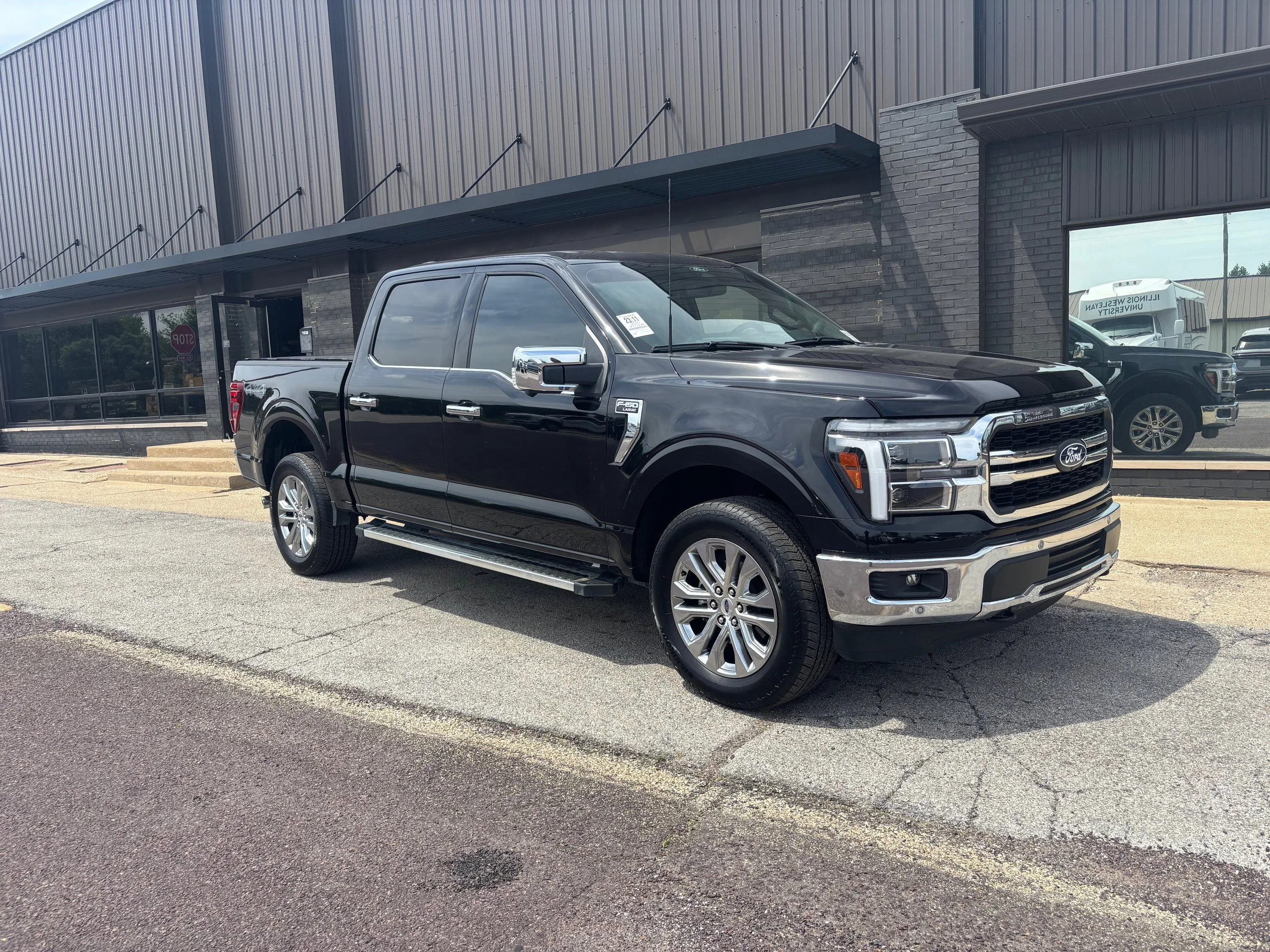 Used 2025 Agate Black Metallic Ford LARIAT image 3