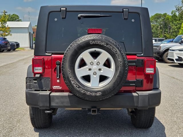 Used 2013 Red Jeep Unlimited Sport image 4