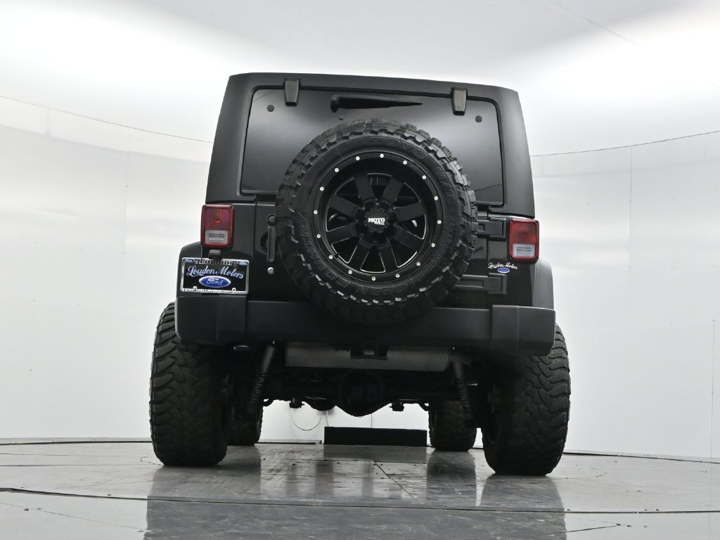 Used 2014 Black Clearcoat Jeep Unlimited Sport image 50