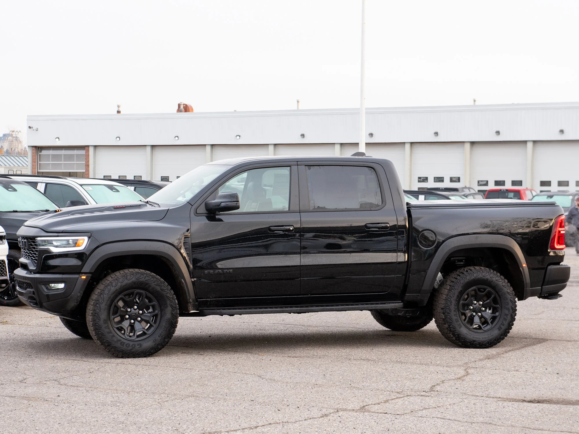 New 2026 Black RAM RHO* Crew Cab 4x4, 540HP, 35 Inch Tires, Massage Seats, Passenger Screen image 3