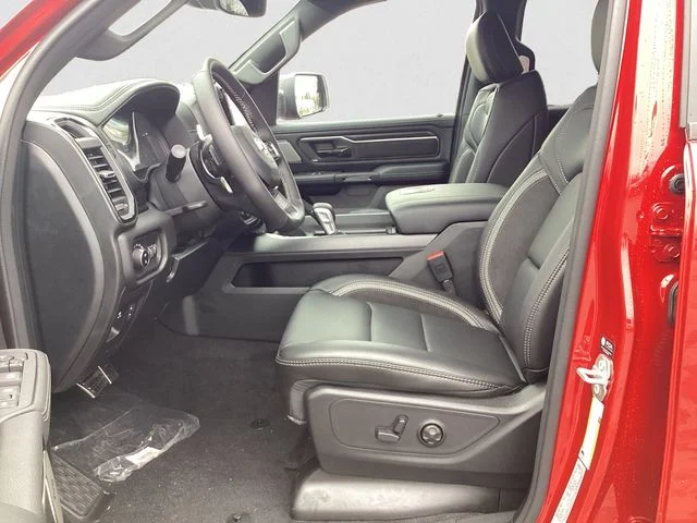 New 2026 Molten Red Ram REBEL CREW CAB 4X4 5