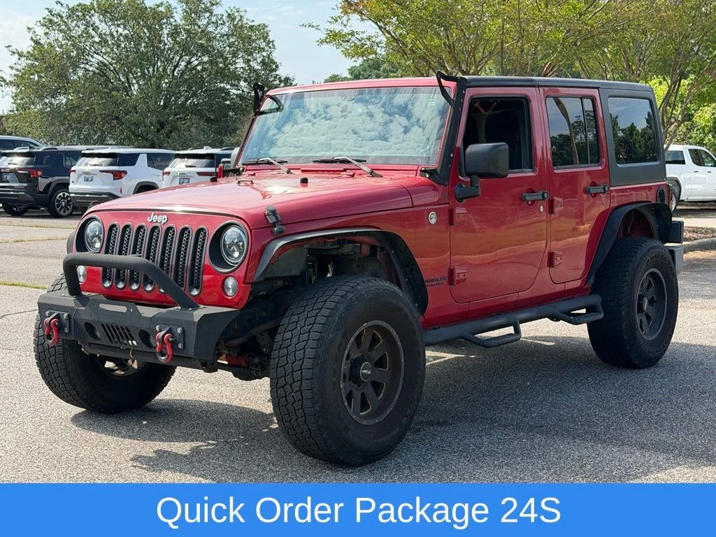 Used 2014 Red Jeep Unlimited Sport image 9