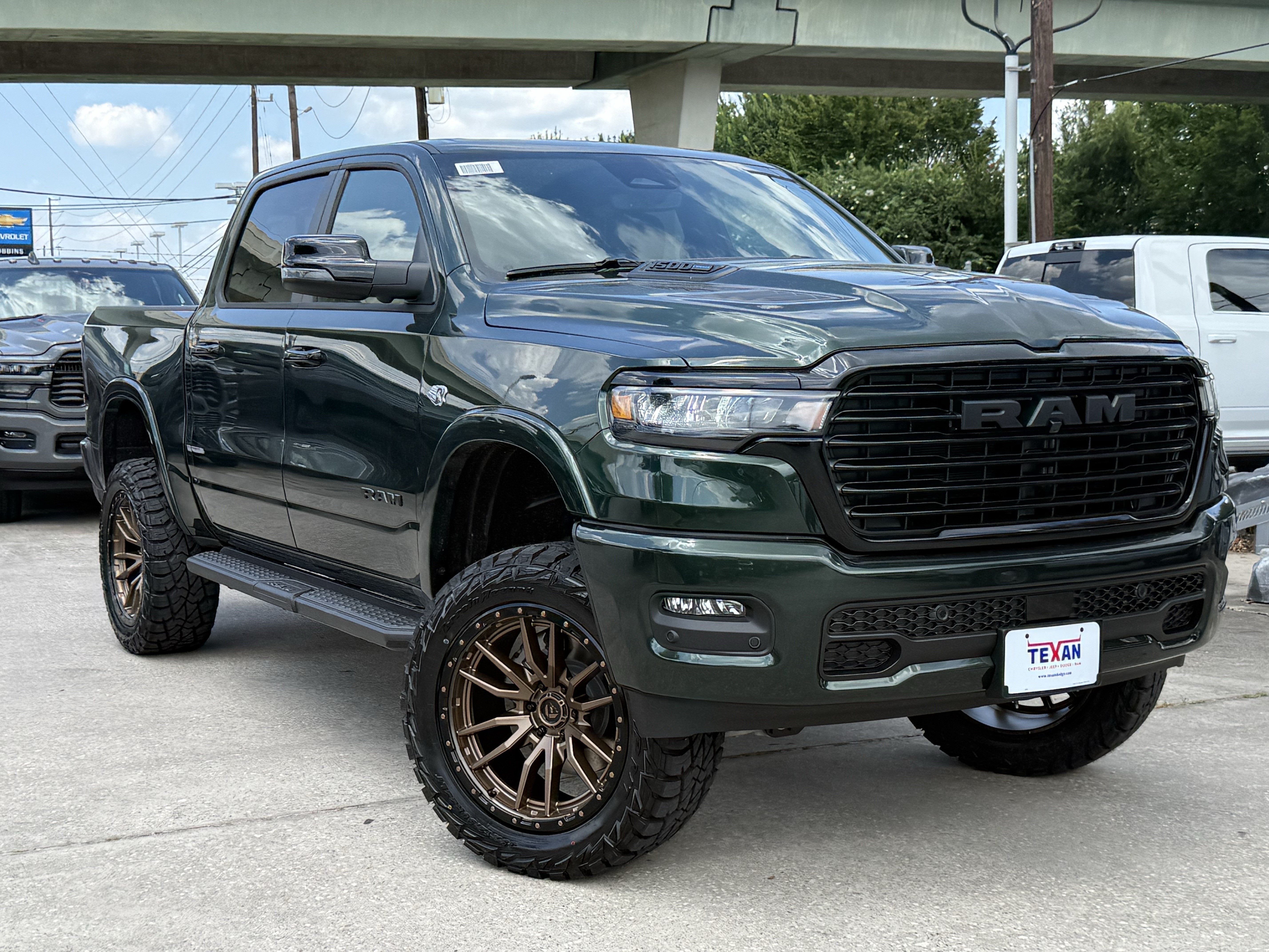 New 2026 Serrano-Green Metallic Exterior Paint RAM Laramie image 2