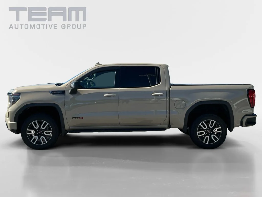 Used 2023 DESERT SAND METALLIC GMC AT4 image 4