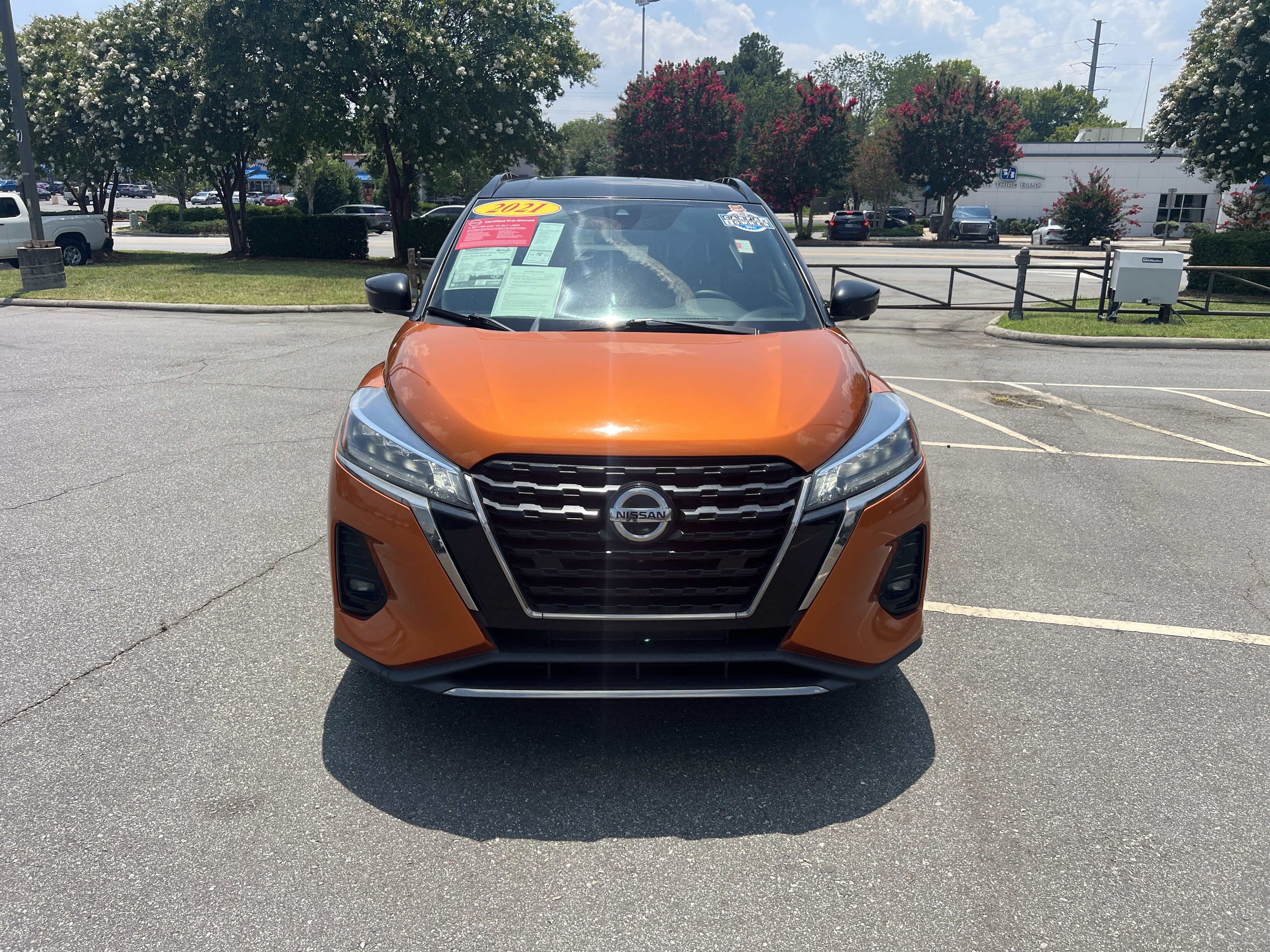 Certified Used 2021 Monarch Orange/Super Black Nissan SR image 2