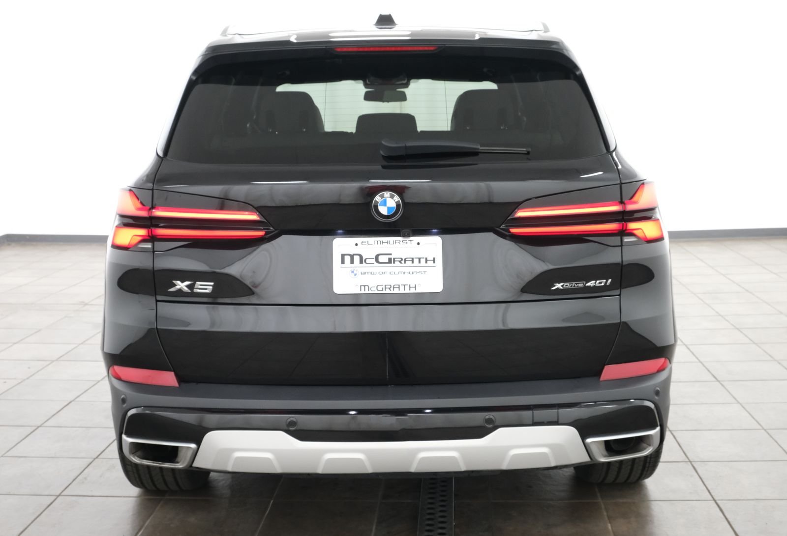 Certified Used 2024 Black Sapphire Metallic BMW xDrive40i image 4