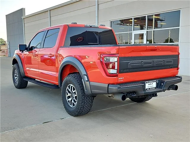 Used 2023 Orange Ford Raptor 4x4 SuperCrew Cab 5.5 ft. box 145 in. WB image 2