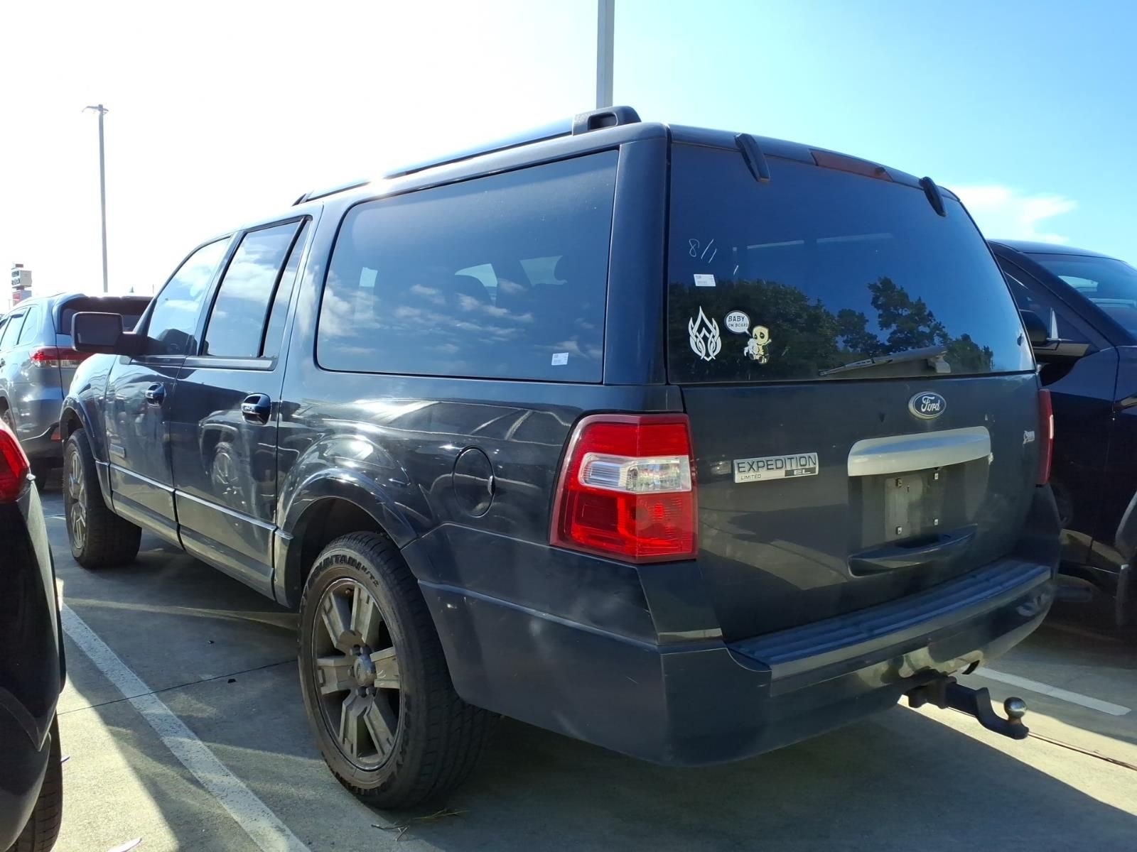 Used 2010 Tuxedo Black Metallic Ford Limited image 2
