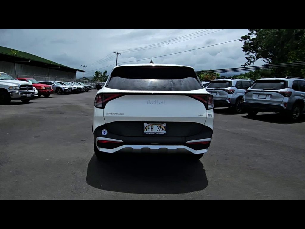 Used 2023 Snow White Pearl Kia LX image 7