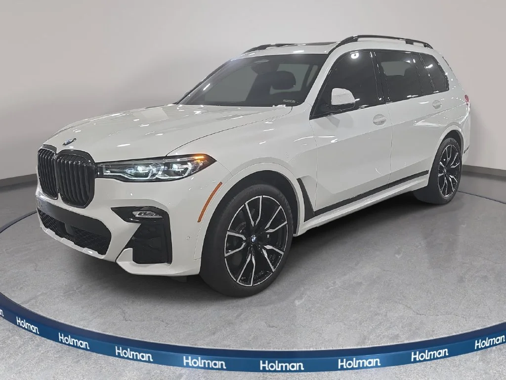 Used 2022 Mineral White Metallic BMW xDrive40i image 1