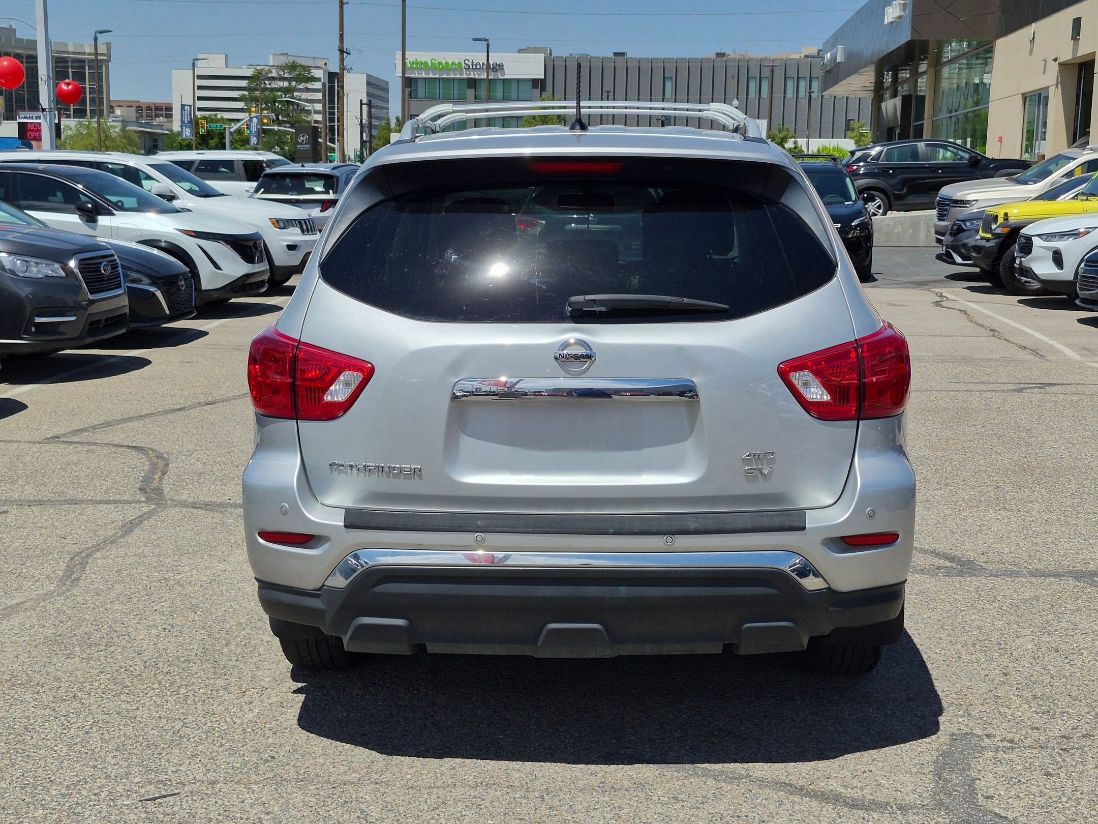 Used 2017 Brilliant Silver Metallic Nissan SV image 4