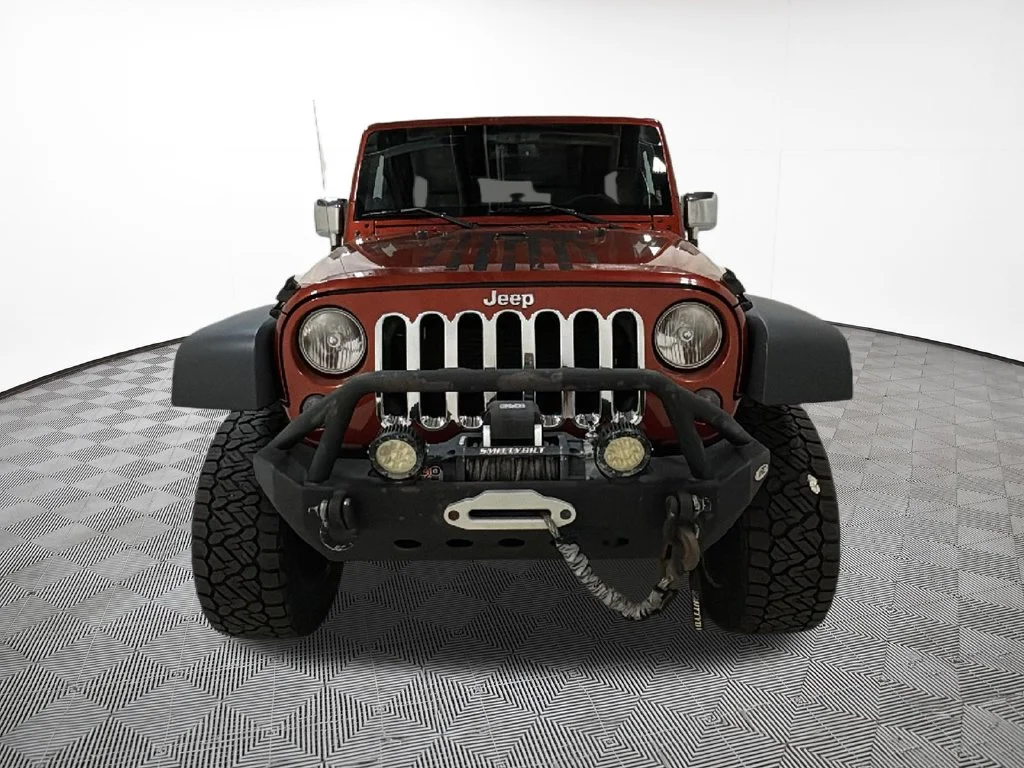 Used 2014 Orange Jeep Unlimited Sport image 3