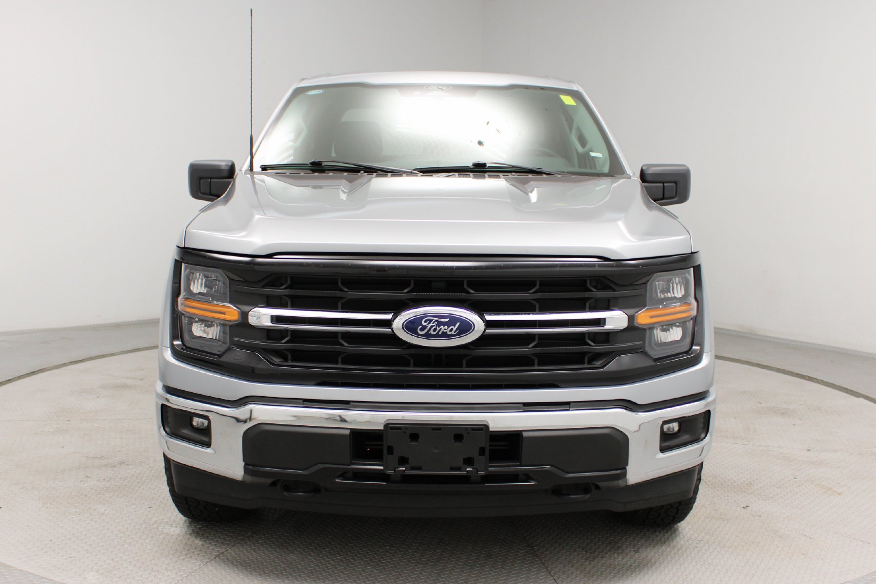 Used 2025 ICONIC SILVER METALLIC Ford XLT 4WD SuperCrew 5.5