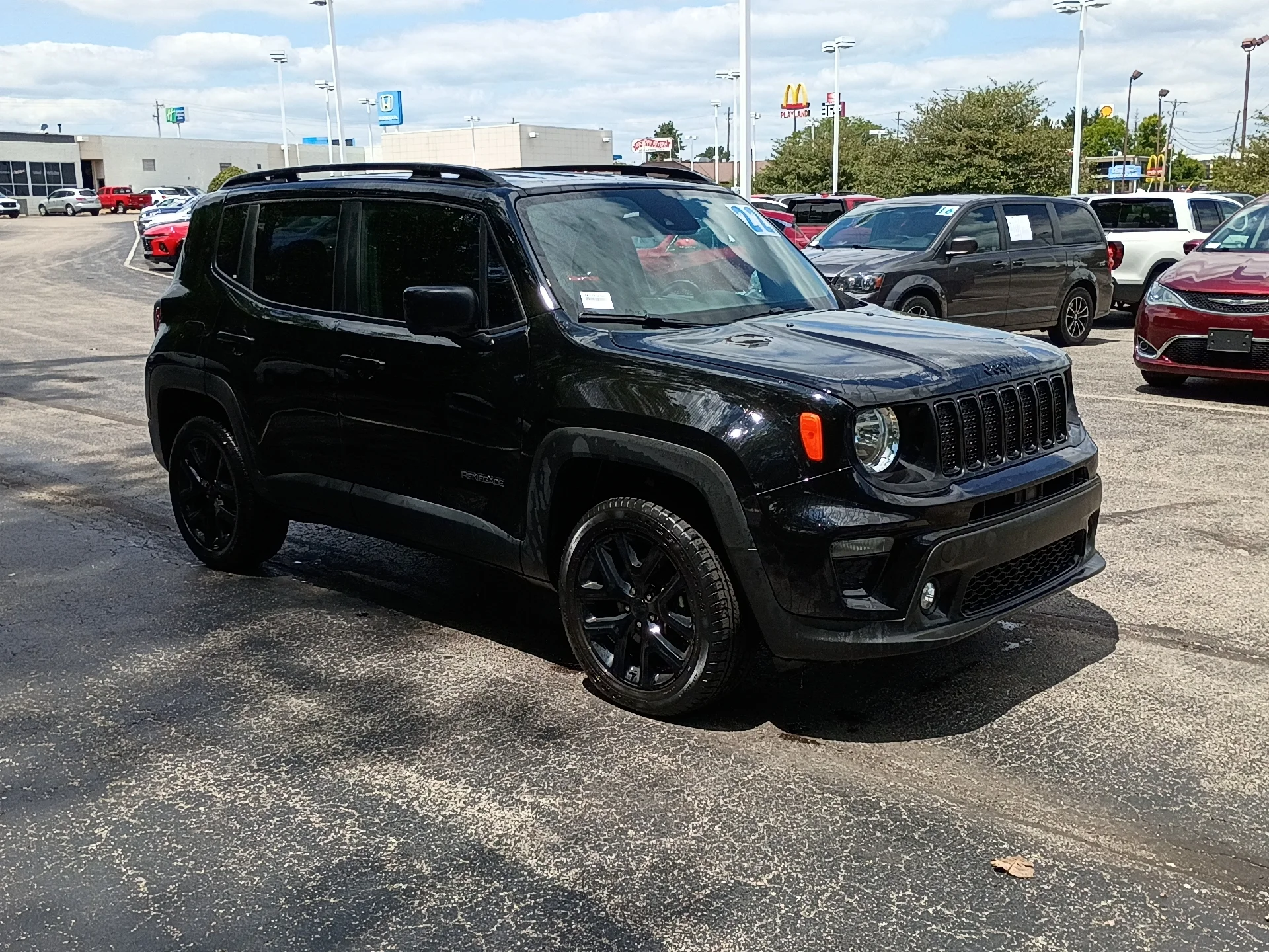 Used 2022 Black Clear Coat Jeep Altitude image 1