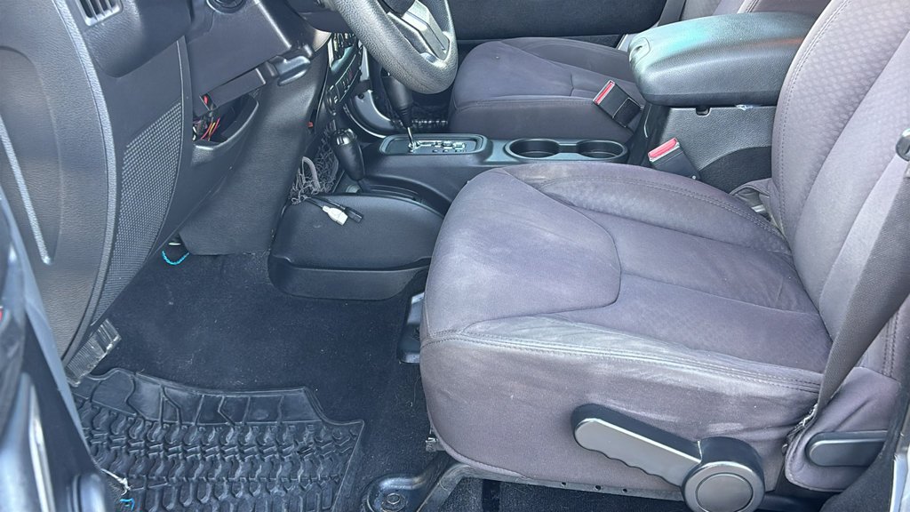 Used 2013 Billet Clearcoat Metallic Jeep Unlimited Sport image 19