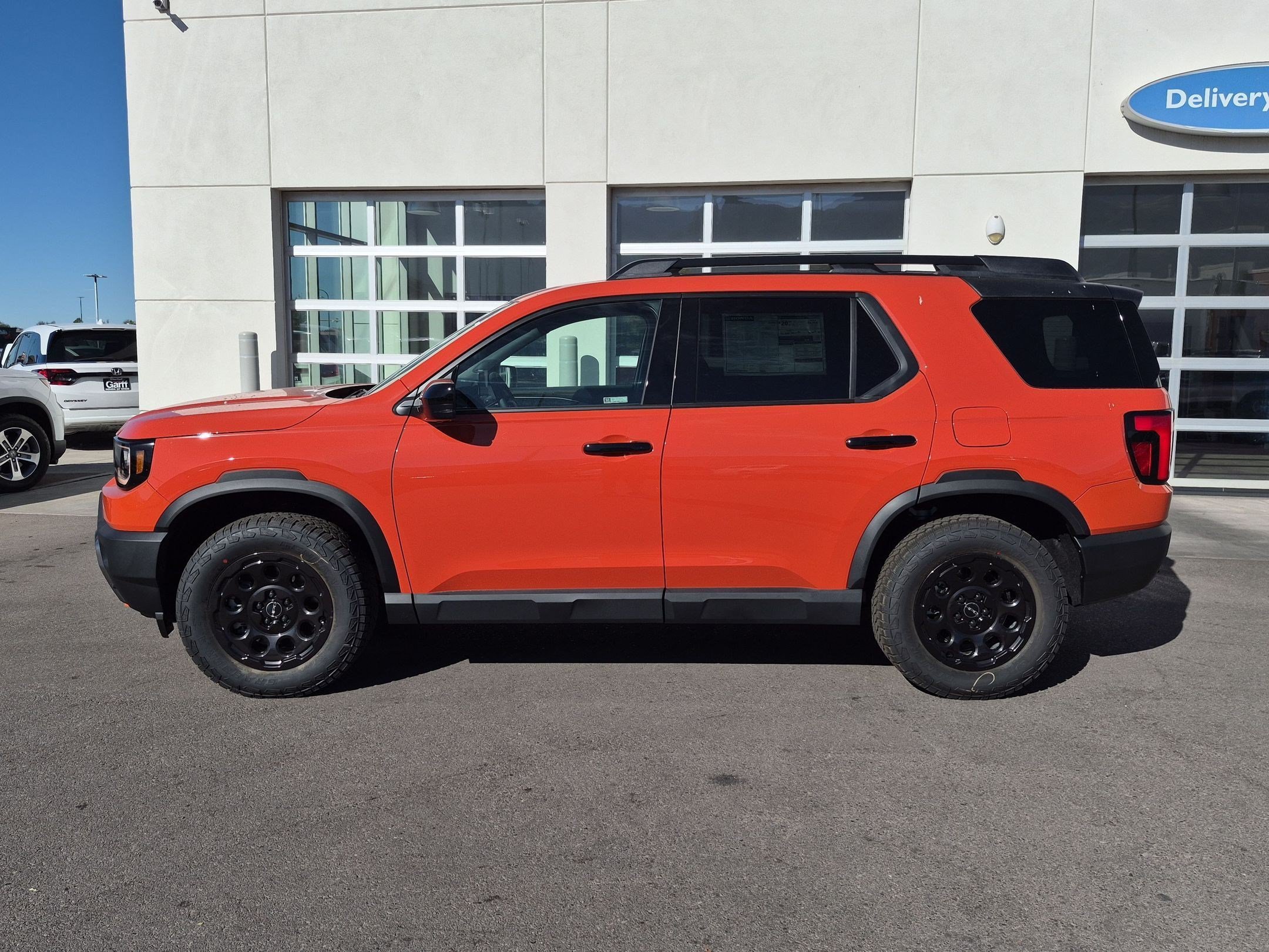 New 2026 Sunset Orange Honda TrailSport Elite Blackout image 7