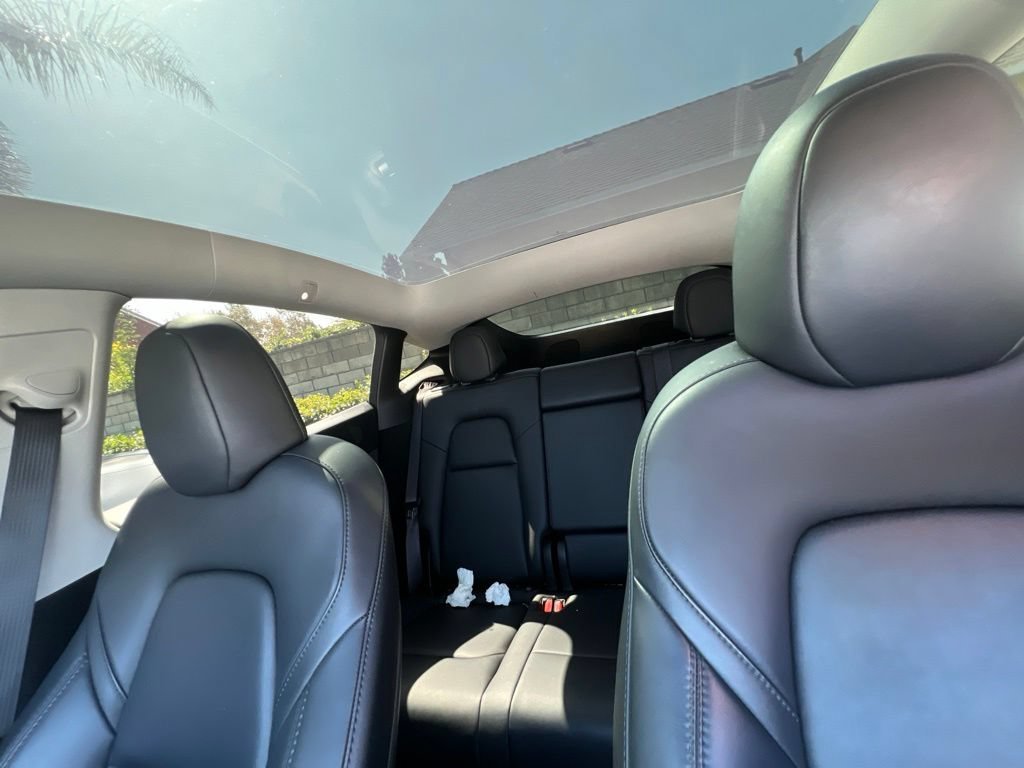 Used 2023 Solid Black Tesla Performance image 9