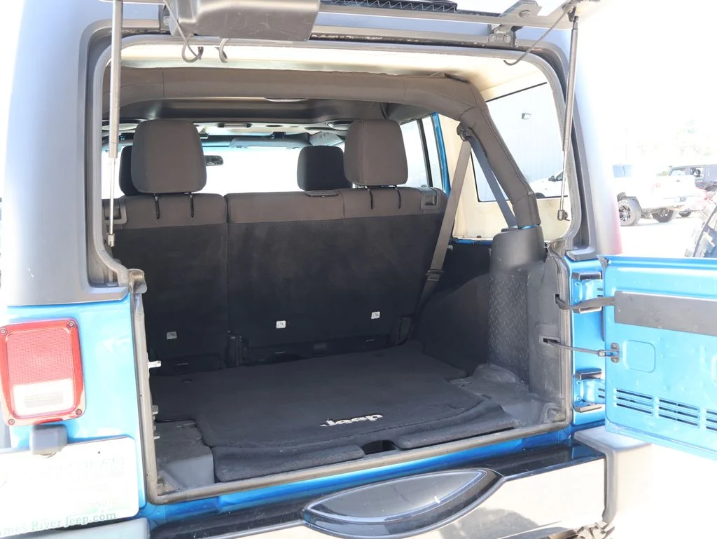 Used 2014 Blue Jeep Unlimited Sport image 14