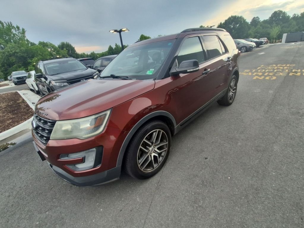 Used 2016 Ruby Red Metallic Tinted Clearcoat Ford Sport image 1