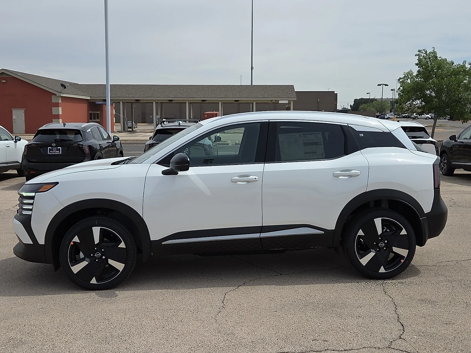 New 2026 QAC Aspen Whit Nissan SR Front-Wheel Drive image 2