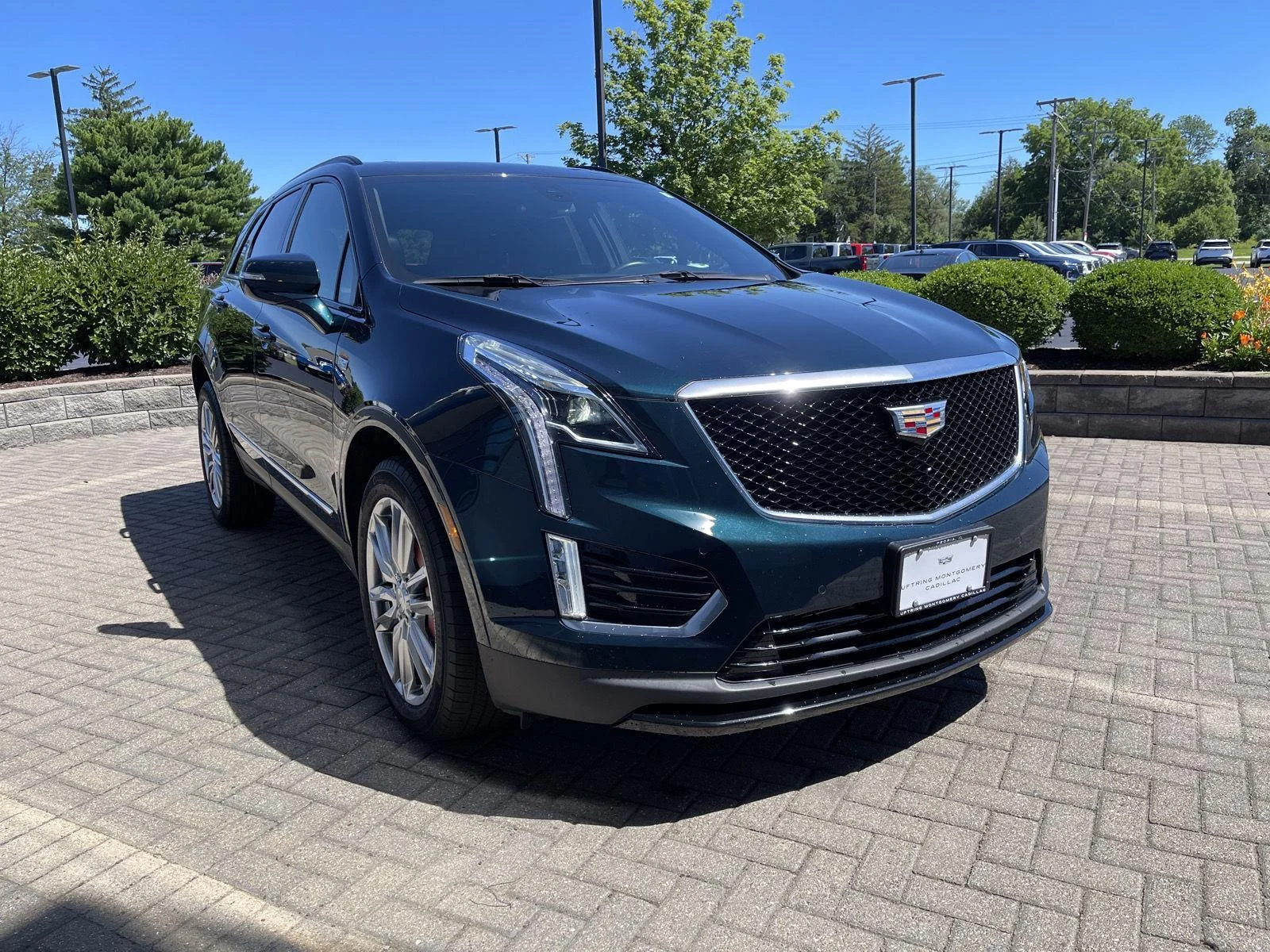Used 2024 Emerald Lake Metallic Cadillac Sport image 7