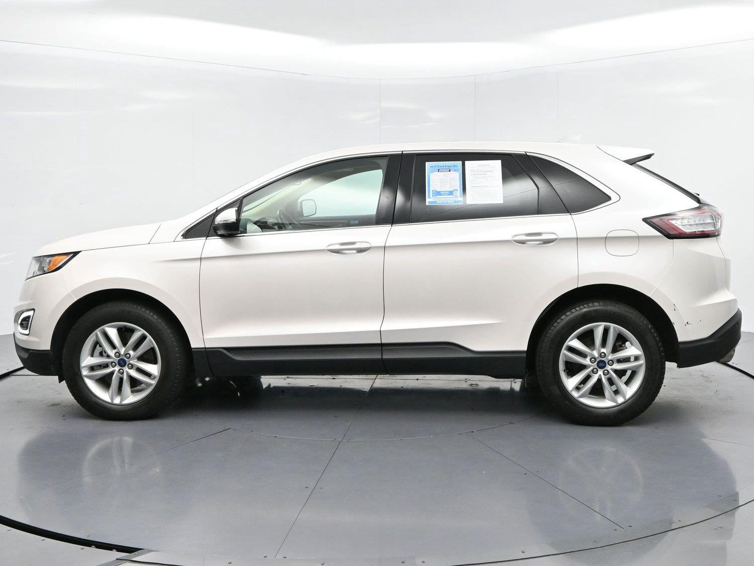 Used 2017 White Platinum Metallic Tri-Coat Ford SEL image 4