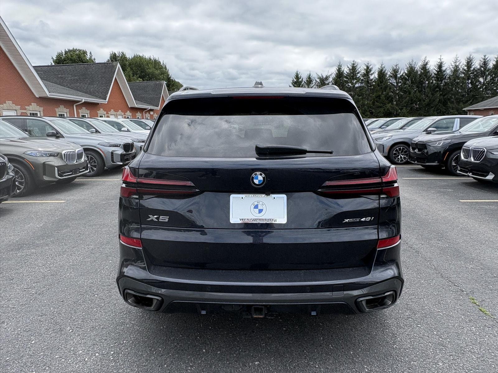Used 2024 Carbon Black Metallic BMW xDrive40i image 4