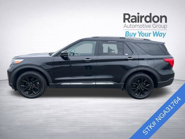 Used 2022 Black Metallic Ford Limited image 4