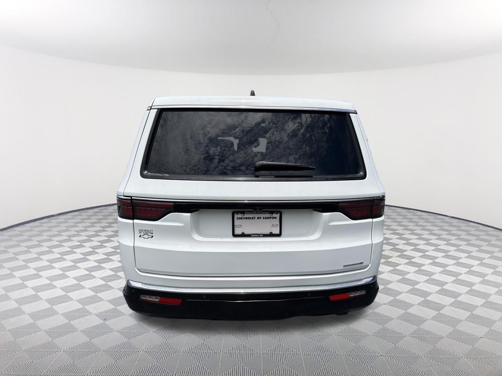 Used 2024 Bright White Cl Jeep Series II image 6