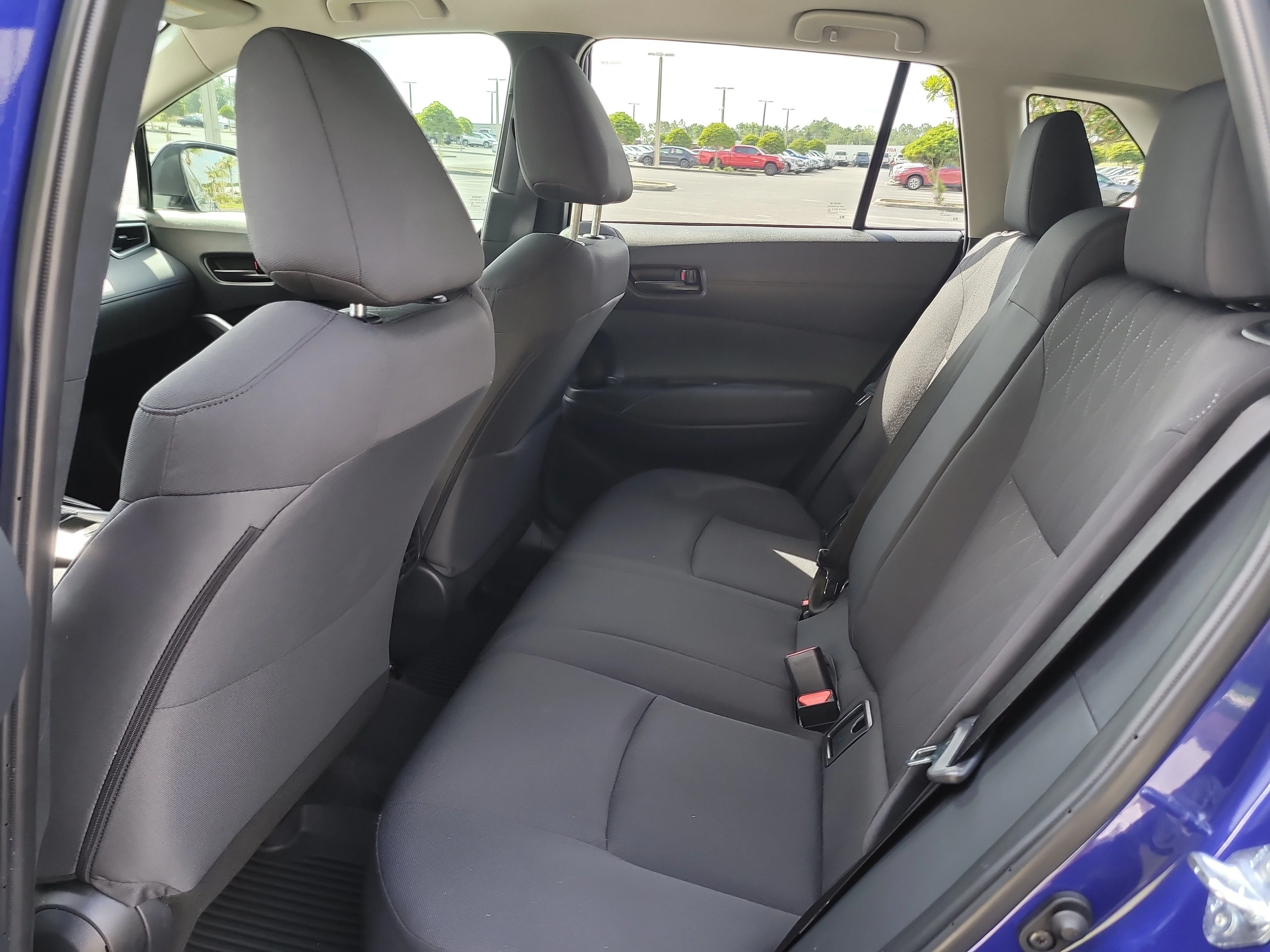 Used 2025 Blue Crush Metallic Toyota LE image 13