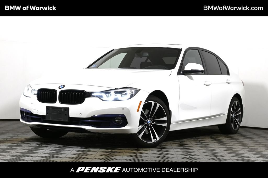Used 2018 White BMW 330i xDrive image 1