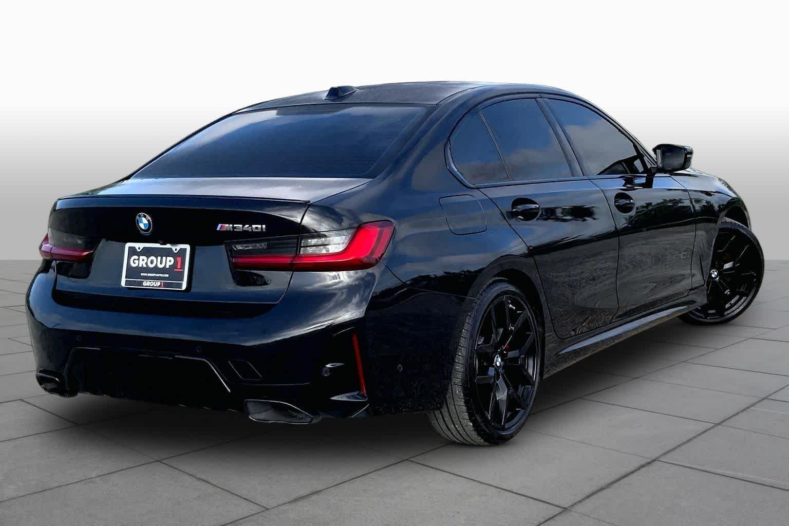 Used 2025 Black Sapphire Metallic BMW M340i image 13