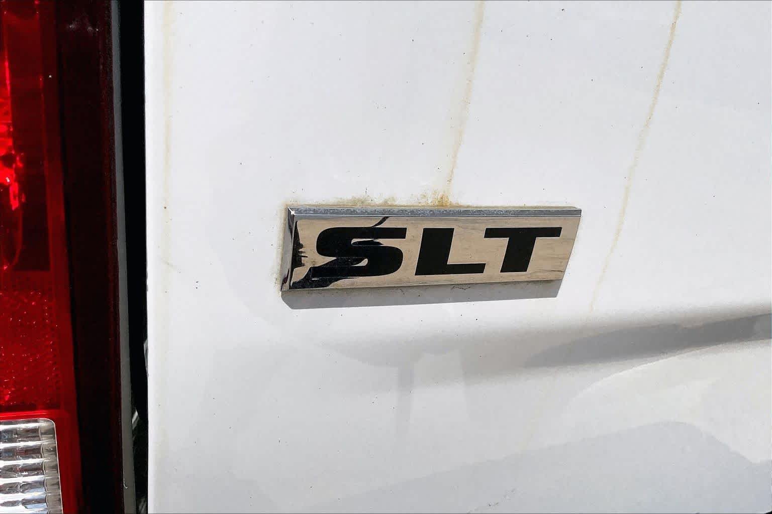 Used 2022 Bright White Clearcoat Ram SLT image 9