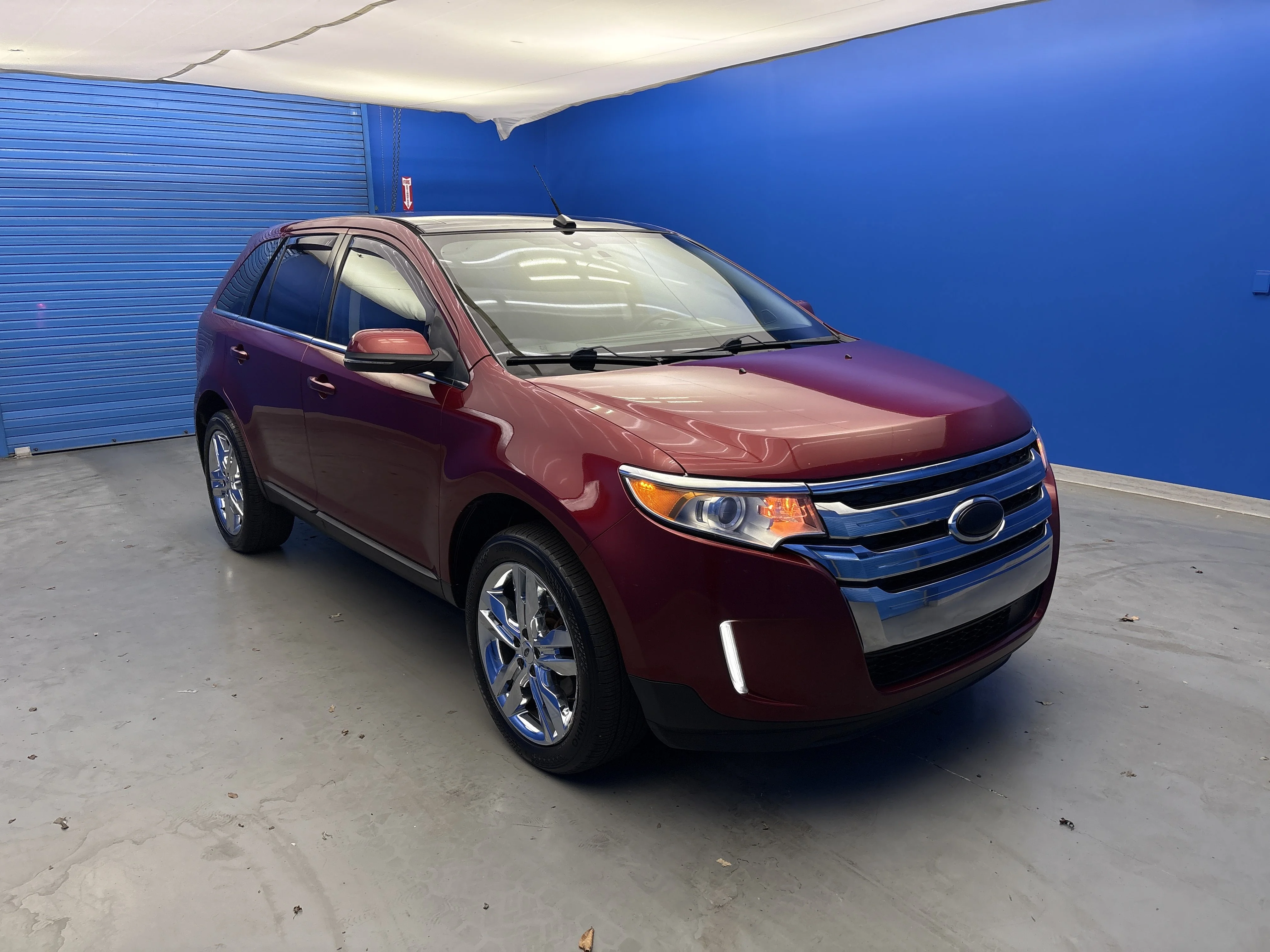 Used 2013 Ruby Red Metallic Ford Limited image 2
