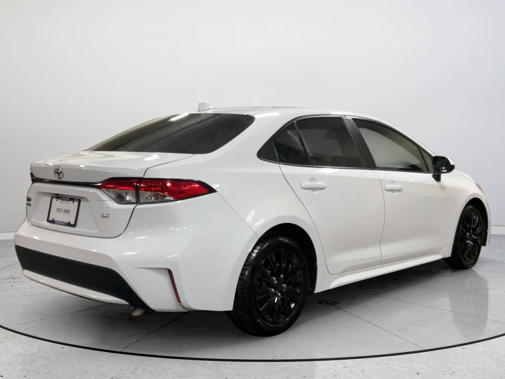 Used 2021 White Toyota LE image 7