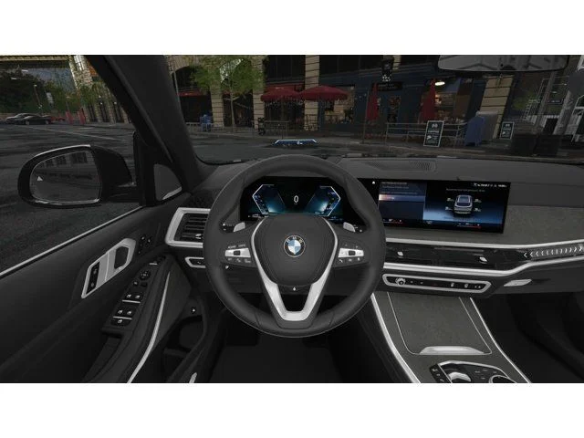 Used 2026 Black Sapphire Metallic BMW xDrive50e image 13
